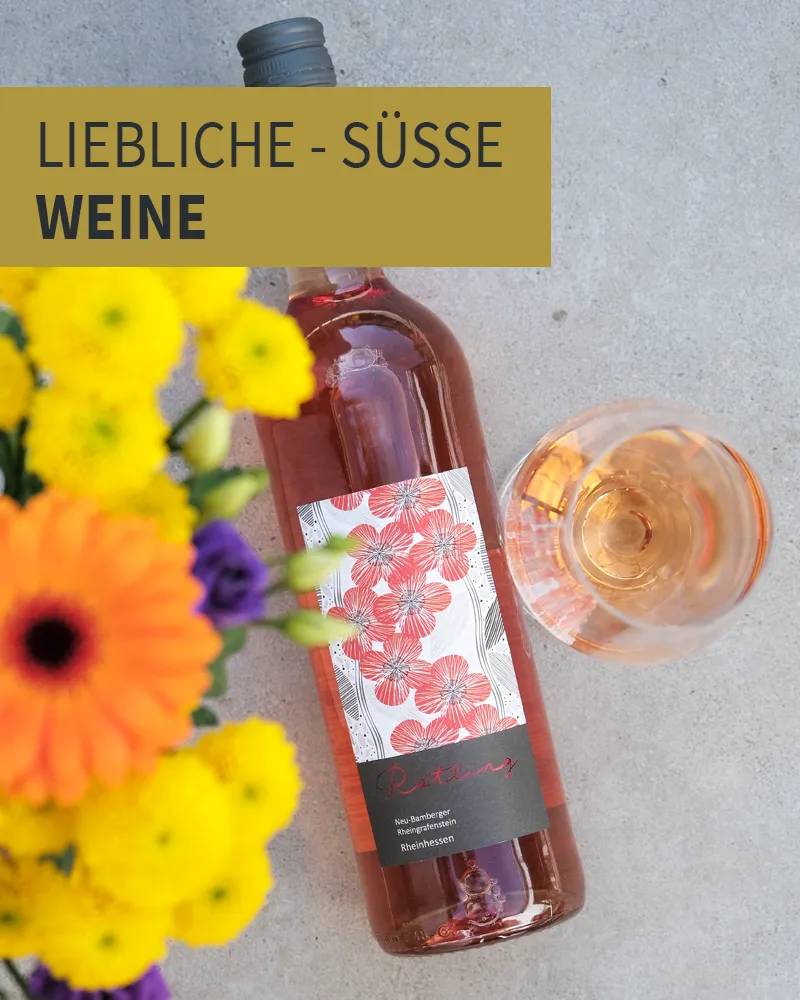 Flasche Wein und Blumen